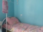 Ворожий снаряд влучив у подвір'я: жительку Білозерки госпіталізували